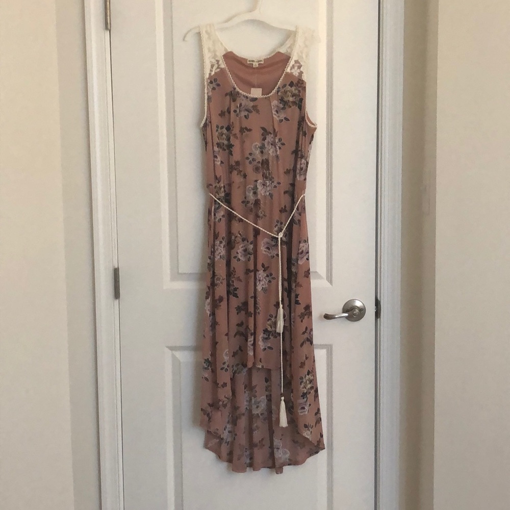 High-low sleeveless dress.
